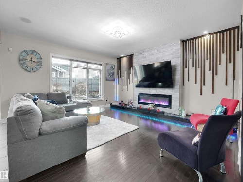 2422 Warry Place Sw, Edmonton, AB - Indoor Photo Showing Living Room With Fireplace