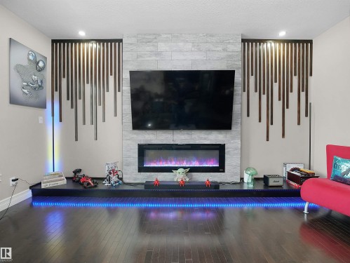 2422 Warry Place Sw, Edmonton, AB - Indoor Photo Showing Living Room With Fireplace