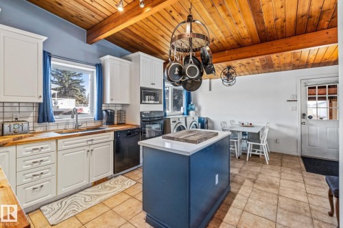 318 Main Street, Ferintosh, AB - Indoor Photo Showing Kitchen With Double Sink