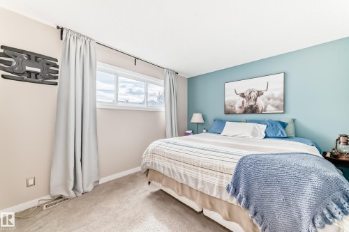 8113 27 Avenue, Edmonton, AB - Indoor Photo Showing Bedroom