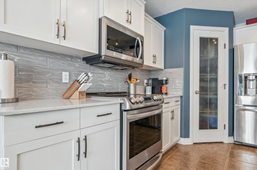 21 Hillcrest Point(E), Fort Saskatchewan, AB - Indoor Photo Showing Kitchen With Upgraded Kitchen