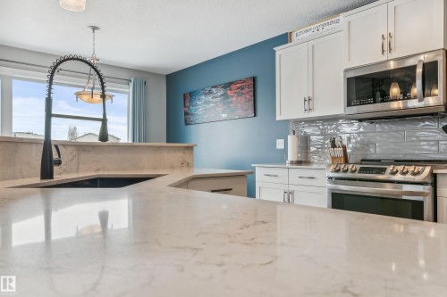 21 Hillcrest Point(E), Fort Saskatchewan, AB - Indoor Photo Showing Kitchen With Upgraded Kitchen