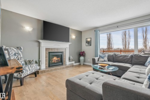 21 Hillcrest Point(E), Fort Saskatchewan, AB - Indoor Photo Showing Living Room With Fireplace