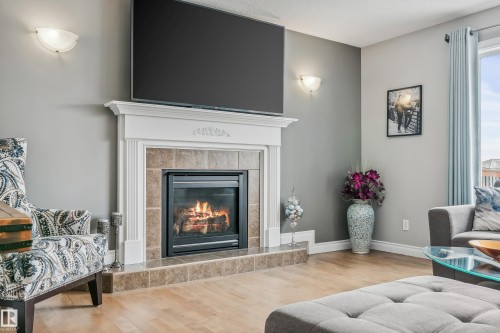 21 Hillcrest Point(E), Fort Saskatchewan, AB - Indoor Photo Showing Living Room With Fireplace