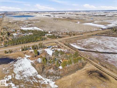 Aerial perspective showcasing a parcel of land with a treed area - 25750 18 Street, Edmonton, AB - Outdoor With View