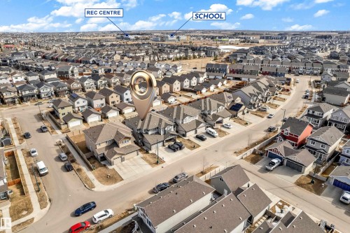 Aerial view showcasing a residential neighborhood with varied housing styles - 2526 19A Avenue, Edmonton, AB - Outdoor With View