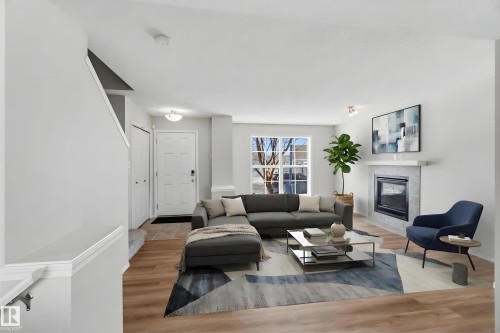 2003 71 Street, Edmonton, AB - Indoor Photo Showing Living Room With Fireplace