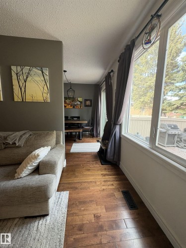 Hardwood flooring extending through the space - 79 Akinsdale Gardens, St. Albert, AB - Indoor Photo Showing Other Room