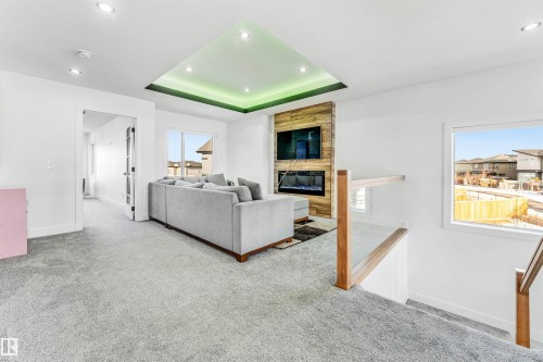 5355 Kimball Place, Edmonton, AB - Indoor Photo Showing Other Room With Fireplace