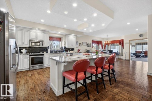 57 Longview Drive, Spruce Grove, AB - Indoor Photo Showing Kitchen With Upgraded Kitchen