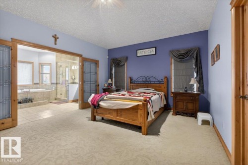 57 Longview Drive, Spruce Grove, AB - Indoor Photo Showing Bedroom