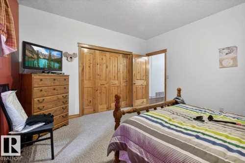 57 Longview Drive, Spruce Grove, AB - Indoor Photo Showing Bedroom