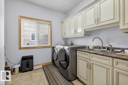 57 Longview Drive, Spruce Grove, AB - Indoor Photo Showing Laundry Room