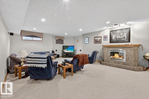 57 Longview Drive, Spruce Grove, AB - Indoor With Fireplace