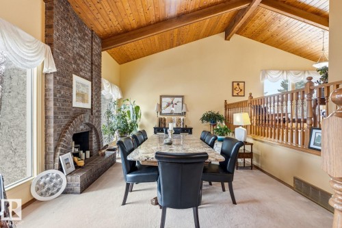 Vaulted wood-finish ceiling with exposed beams - 11707 29 Avenue Nw, Edmonton, AB - Indoor Photo Showing Dining Room