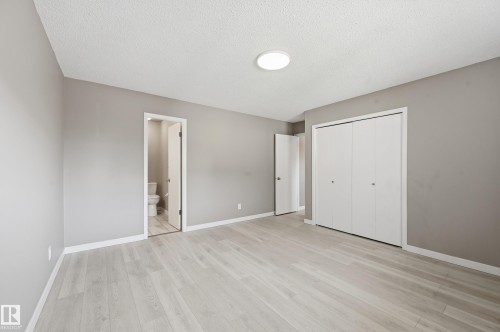 This room features light-colored flooring, neutral-toned walls, and a recessed ceiling light fixture - 6907 19 Avenue, Edmonton, AB - Indoor Photo Showing Other Room