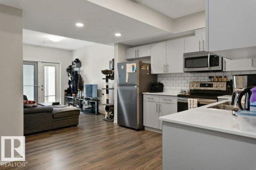9939 222 Street, Edmonton, AB - Indoor Photo Showing Kitchen With Stainless Steel Kitchen With Double Sink