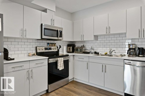 9939 222 Street, Edmonton, AB - Indoor Photo Showing Kitchen With Stainless Steel Kitchen With Double Sink With Upgraded Kitchen