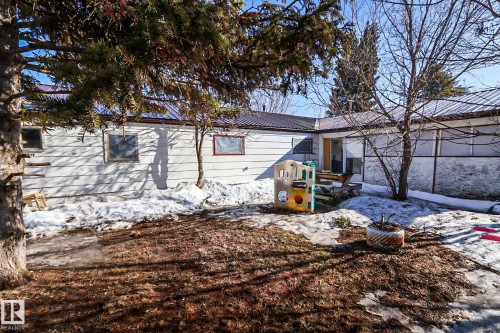 Exterior siding with a metal roof - 4114 Main Street, Ashmont, AB - Outdoor