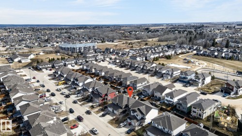 Residential neighborhood featuring a grid-pattern street layout, uniformly gabled rooftops, and individual detached properties - 2017 Westerra Loop, Stony Plain, AB - Outdoor With View