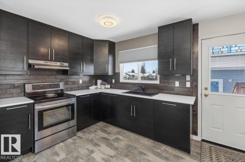24 Duke Drive, Lamont, AB - Indoor Photo Showing Kitchen With Double Sink