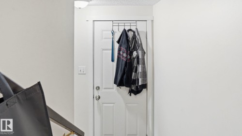 White paneled door with brushed nickel hardware - 12 14120 80 Street, Edmonton, AB - Indoor