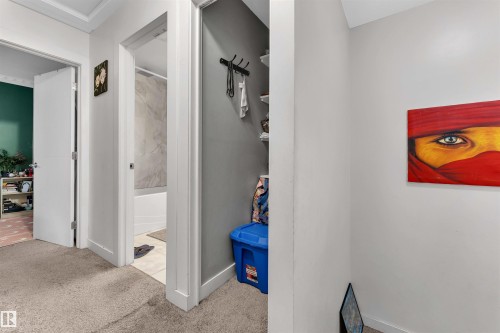 Hallway featuring carpeted flooring and white trim - 7 14115 82 Street, Edmonton, AB - Indoor Photo Showing Other Room