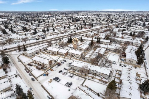 Aerial view showcasing a residential community with multiple townhouse complexes - 7 14115 82 Street, Edmonton, AB - Outdoor With View