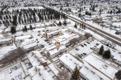 Aerial perspective showcasing a residential community with multi-unit structures - 