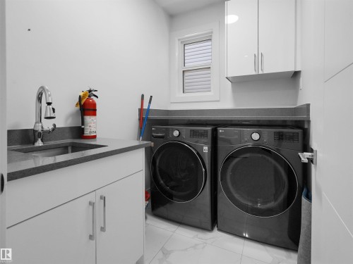 6607 55 Avenue, Beaumont, AB - Indoor Photo Showing Laundry Room