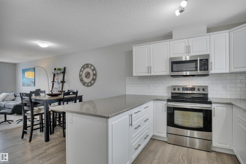 427 Simpkins Link, Leduc, AB - Indoor Photo Showing Kitchen With Upgraded Kitchen