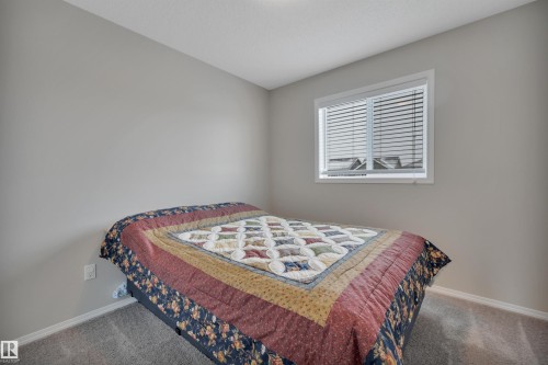 427 Simpkins Link, Leduc, AB - Indoor Photo Showing Bedroom