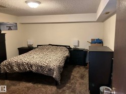Recessed ceiling beam feature with a flush mount light fixture - 