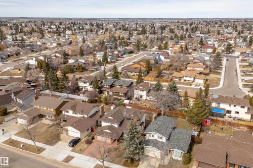 Expansive aerial view showcasing the neighborhood's residential streets and numerous properties - 11020 158 Avenue, Edmonton, AB - Outdoor With View