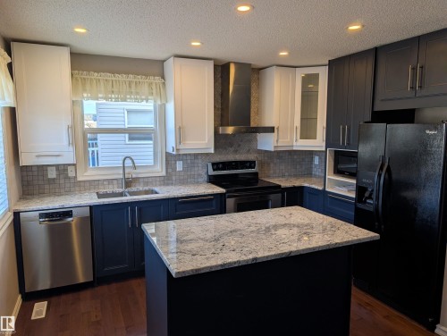 8627 173 Avenue, Edmonton, AB - Indoor Photo Showing Kitchen With Double Sink With Upgraded Kitchen