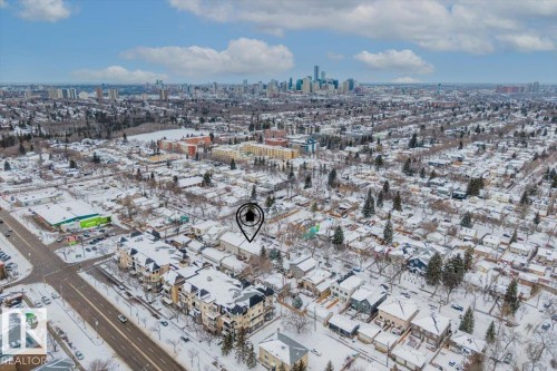 Aerial perspective showcasing a residential area with varied housing styles - 8737 83 Avenue, Edmonton, AB - Outdoor With View