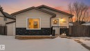 The property features neutral-toned siding with an accent of dark stone cladding - 3908 44 Avenue, Stony Plain, AB  - Outdoor 