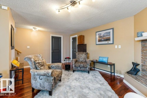17 Donald Place, St. Albert, AB - Indoor Photo Showing Living Room With Fireplace
