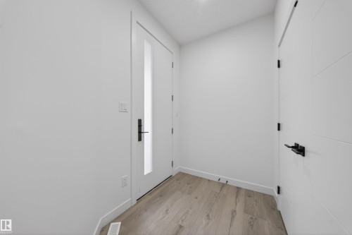 Bright entryway featuring light wood-finish flooring - 3906 41 Avenue, Beaumont, AB - Indoor Photo Showing Other Room