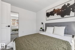 White interior walls with gray carpet flooring - 