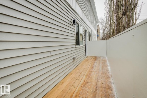 Private outdoor deck featuring natural wood flooring - 10726 107 Street, Edmonton, AB - Outdoor