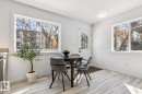 Bright dining area featuring light wood-finish flooring - 10726 107 Street, Edmonton, AB  - Indoor Photo Showing Dining Room 