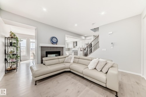 2043 51 Street, Edmonton, AB - Indoor Photo Showing Living Room With Fireplace