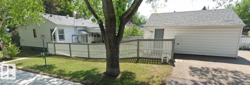 White vinyl siding house with an asphalt shingle roof - 11242 56 Street, Edmonton, AB - Outdoor With Exterior