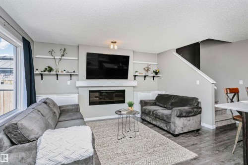 7280 Edgemont Way, Edmonton, AB - Indoor Photo Showing Living Room With Fireplace