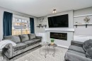 7280 Edgemont Way, Edmonton, AB  - Indoor Photo Showing Living Room With Fireplace 