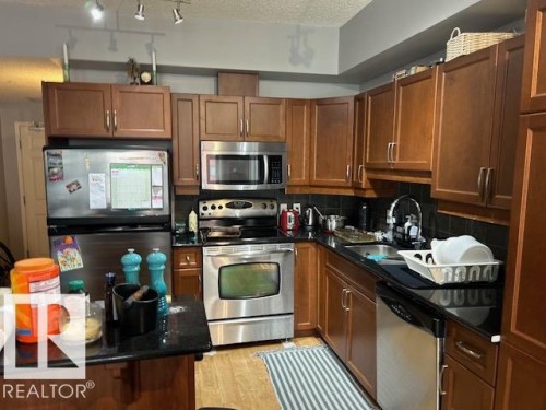 710 10303 111 Street, Edmonton, AB - Indoor Photo Showing Kitchen With Stainless Steel Kitchen