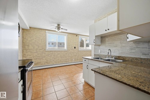 Welcome to #109 14530 52 ST NW - 109 14530 52 Street, Edmonton, AB - Indoor Photo Showing Kitchen With Double Sink
