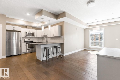 View Of Kitchen And Eating Area. - 203 10006 83 Avenue, Edmonton, AB - Indoor Photo Showing Kitchen With Upgraded Kitchen