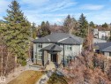 Contemporary two-story residence featuring a gray exterior, stone accents, and a dark shingle roof - 8927 120 Street, Edmonton, AB  - Outdoor 